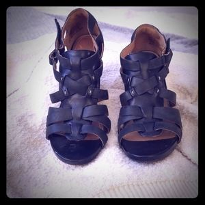 Black heeled ankle sandals